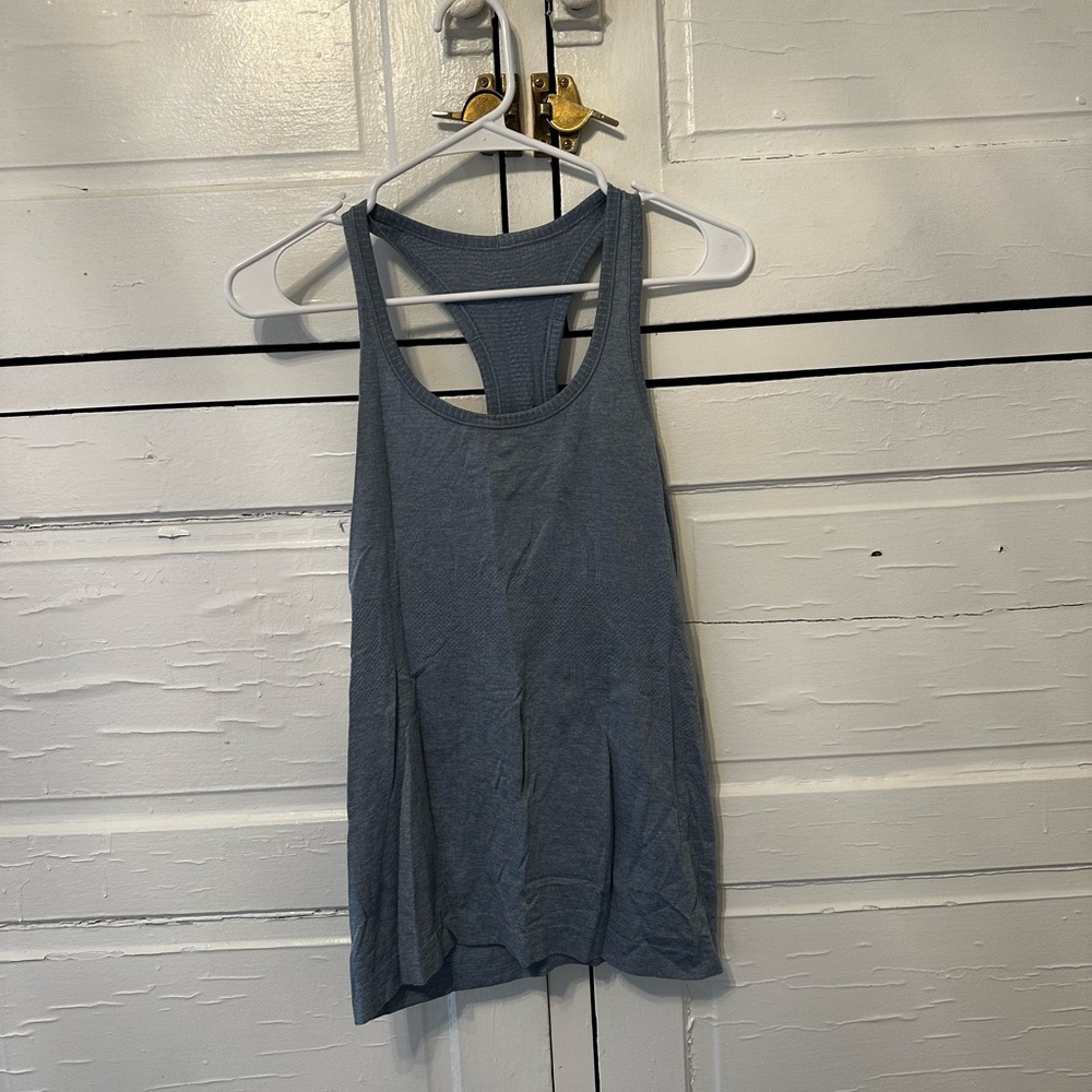 Light blue Lululemon swiftly tech tank top size 6 great condition